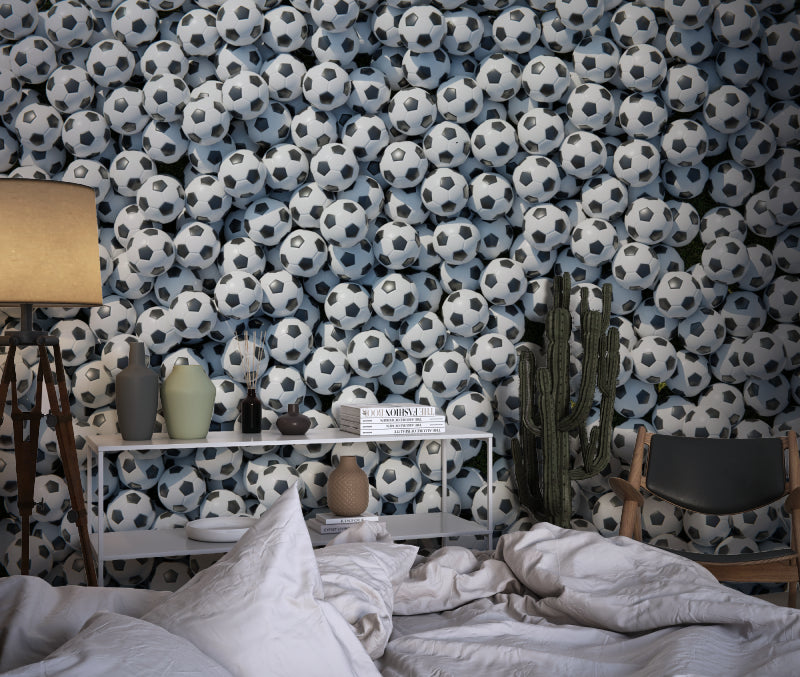 Football wallpaper bringing sporty style to modern teen bedroom with gaming setup