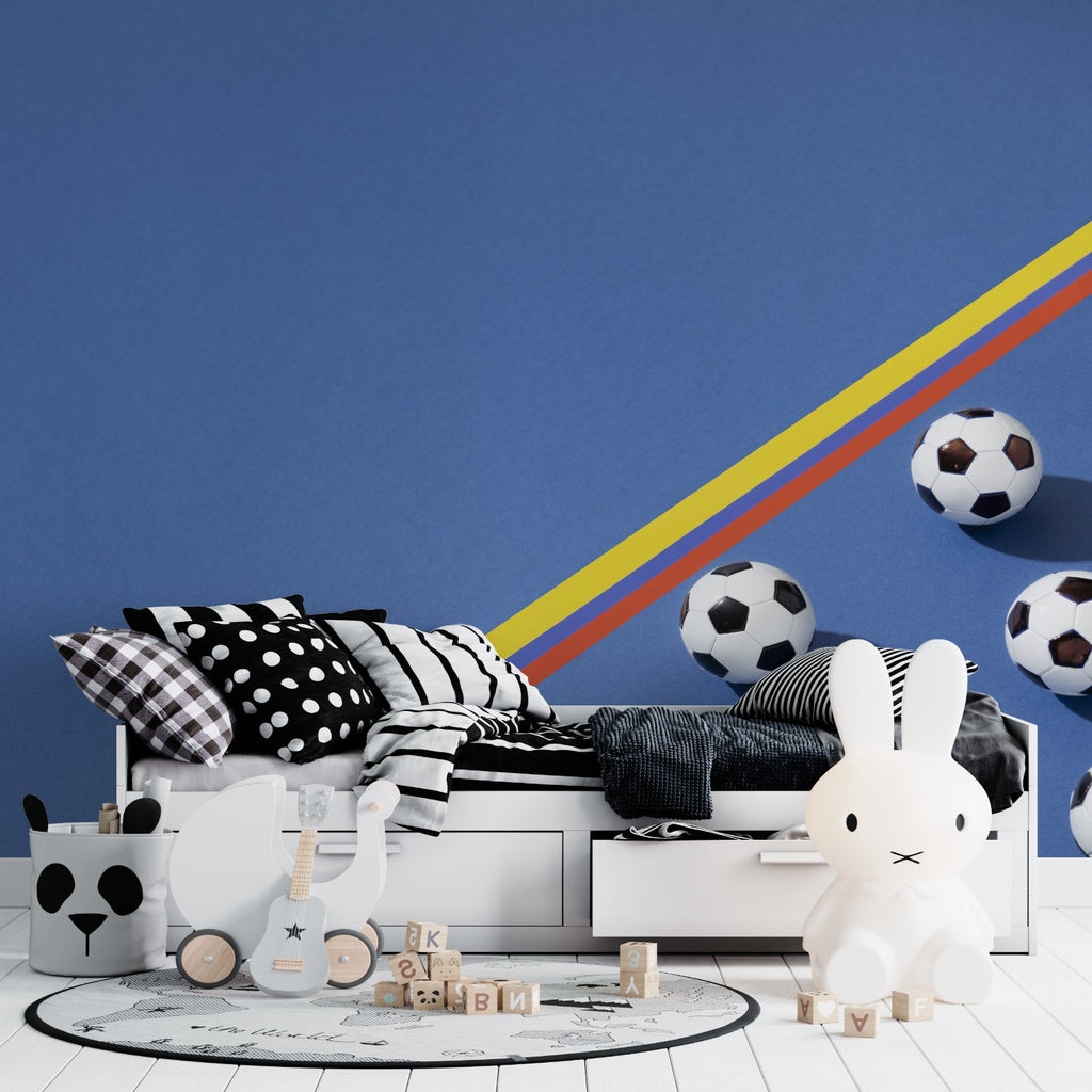 Football wall mural in gaming room showing rainbow design elements