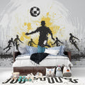 Football wall mural in modern teen bedroom showing dynamic black and gold design with player silhouettes