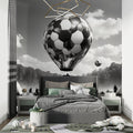 Football balloon wallpaper in modern teen bedroom showing black and white design with dramatic lighting
