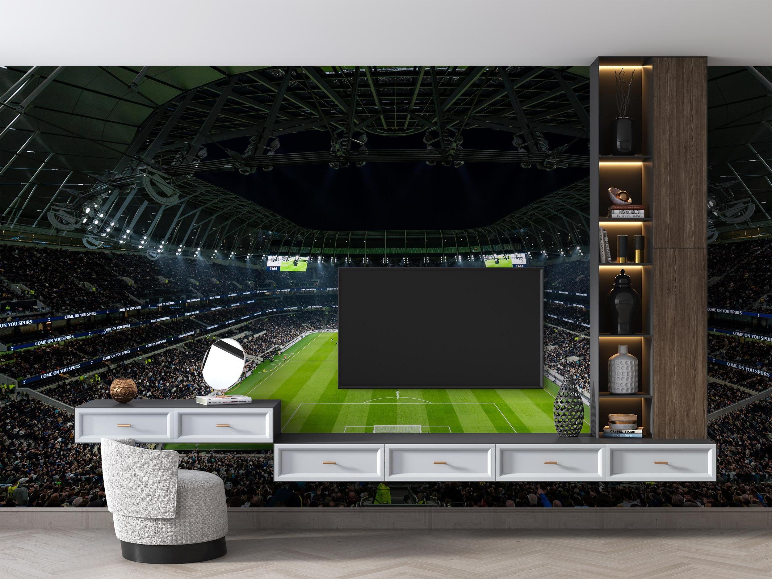 Football stadium mural wallpaper bringing sports atmosphere to a modern gaming room with LED lighting