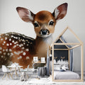 Sweet Baby Deer Wallpaper creates a magical atmosphere in a light-filled nursery with white furniture and natural accents
