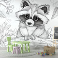 Black and white forest animal wallpaper featuring raccoon design styled in a modern Scandinavian nursery with natural wood furniture