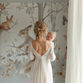 Forest animals wallpaper creating cozy atmosphere in modern nursery with white furniture and natural light