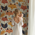 Forest Animals Wallpaper shown in bright nursery with white furniture and natural lighting
