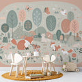 Forest animals wallpaper creating a magical atmosphere in a cozy nursery with soft lighting and natural decor