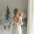 Forest deer wallpaper in a modern living room showing three majestic deer among misty pine trees