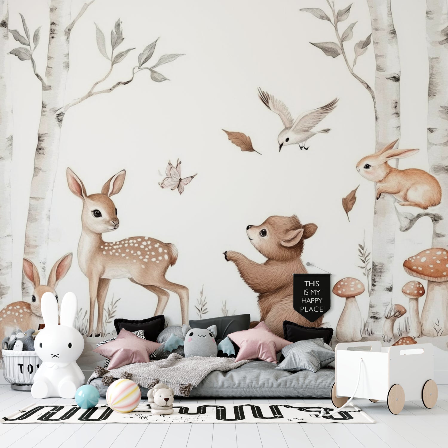 Forest animal mural creating a peaceful atmosphere in a toddler's bedroom