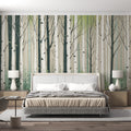 Forest wallpaper mural creating a calm atmosphere in a modern living room with natural light highlighting the birch trees