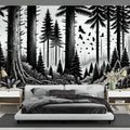 Black and white forest mural wallpaper creating depth in a modern living room with minimal furniture