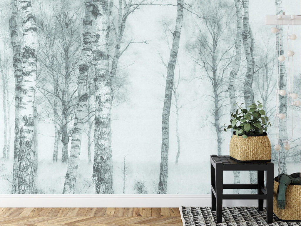 Black and white tree mural creating focal point in dining room