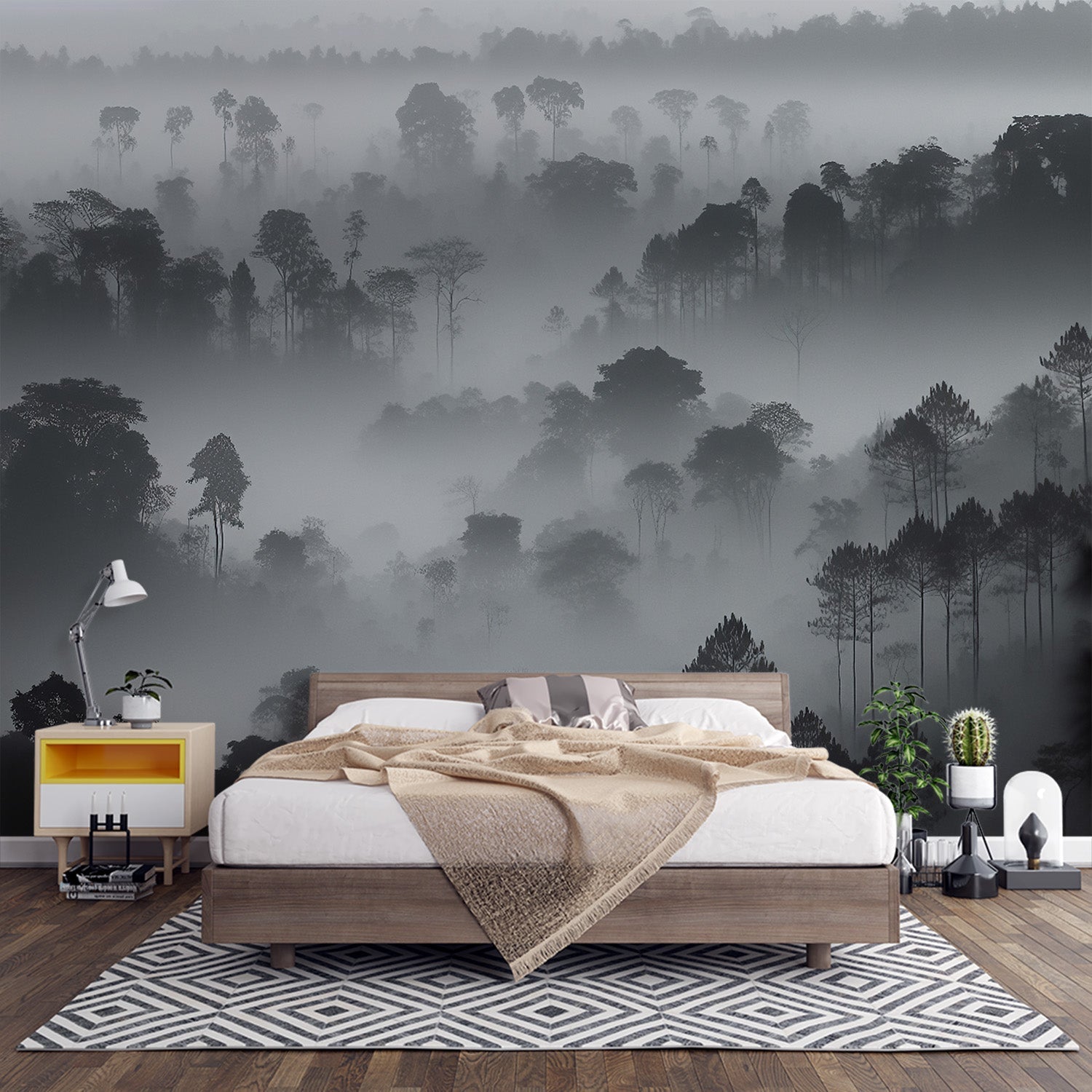 Misty forest wallpaper creating depth in a modern living room with black and white furniture