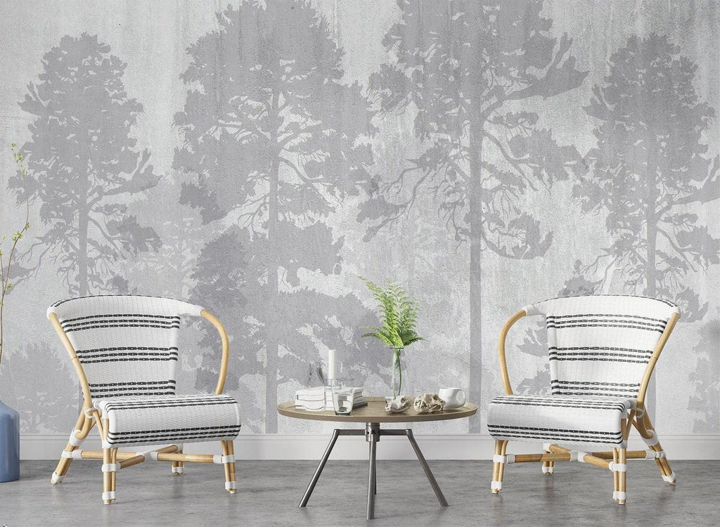 Pine tree wallpaper installation in a minimalist bedroom showing the full-wall misty forest effect