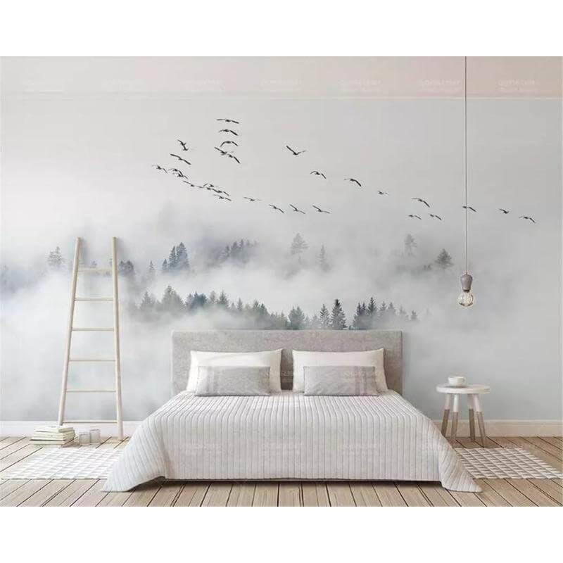 Misty forest wallpaper creating depth in a modern bedroom, morning light filtering through the pine trees and birds
