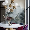 Misty forest wallpaper creating depth in a modern living room with grey furniture and natural light