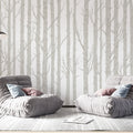 Birch tree wallpaper creating a serene atmosphere in a modern living room with natural light and minimal furniture