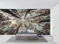 Forest tree wallpaper creating depth in modern living room with tall windows