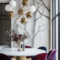 Grey and white birch tree wallpaper in a modern living room creating a peaceful atmosphere