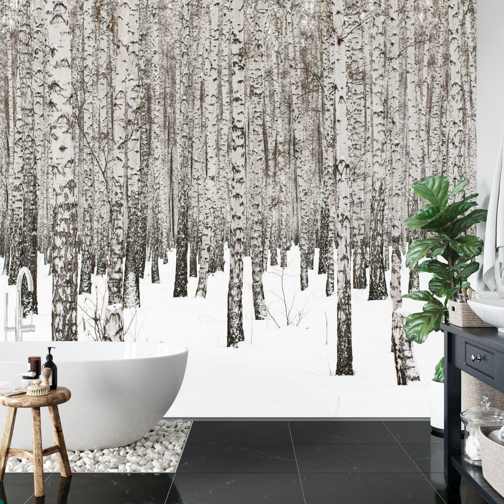 Black and white forest wallpaper making a statement in a cozy dining room setting