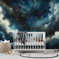 Galaxy constellation wallpaper creating a dreamy atmosphere in a cozy bedroom, with golden stars shimmering against deep blue walls