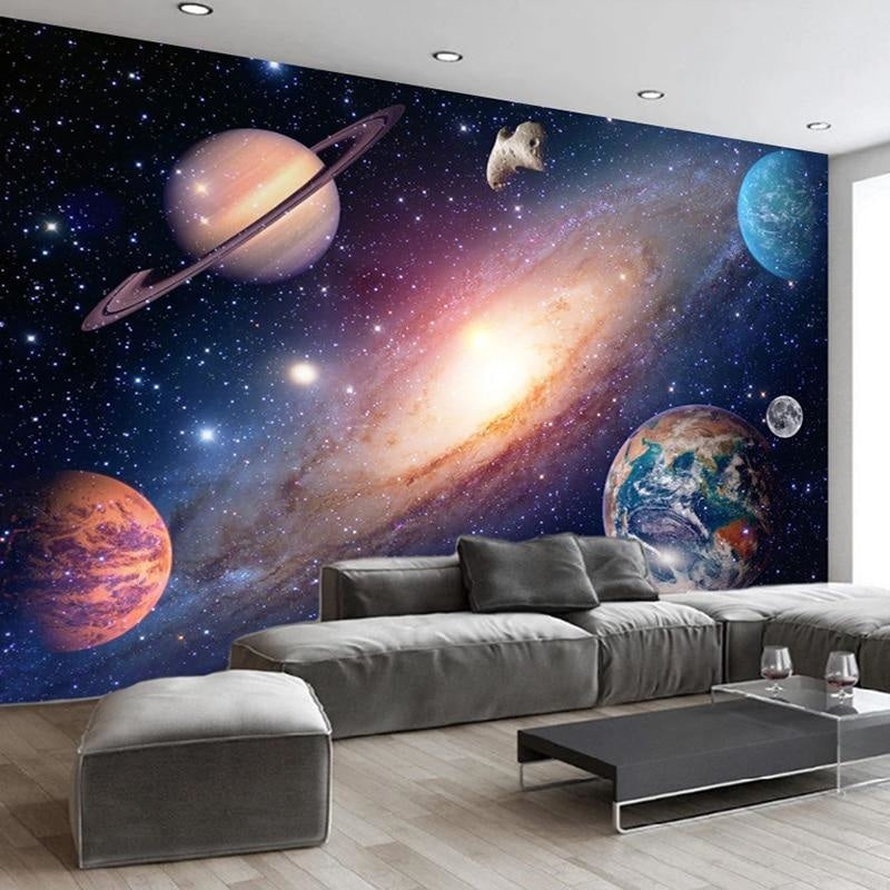Space themed wall mural in modern living room with minimal furniture
