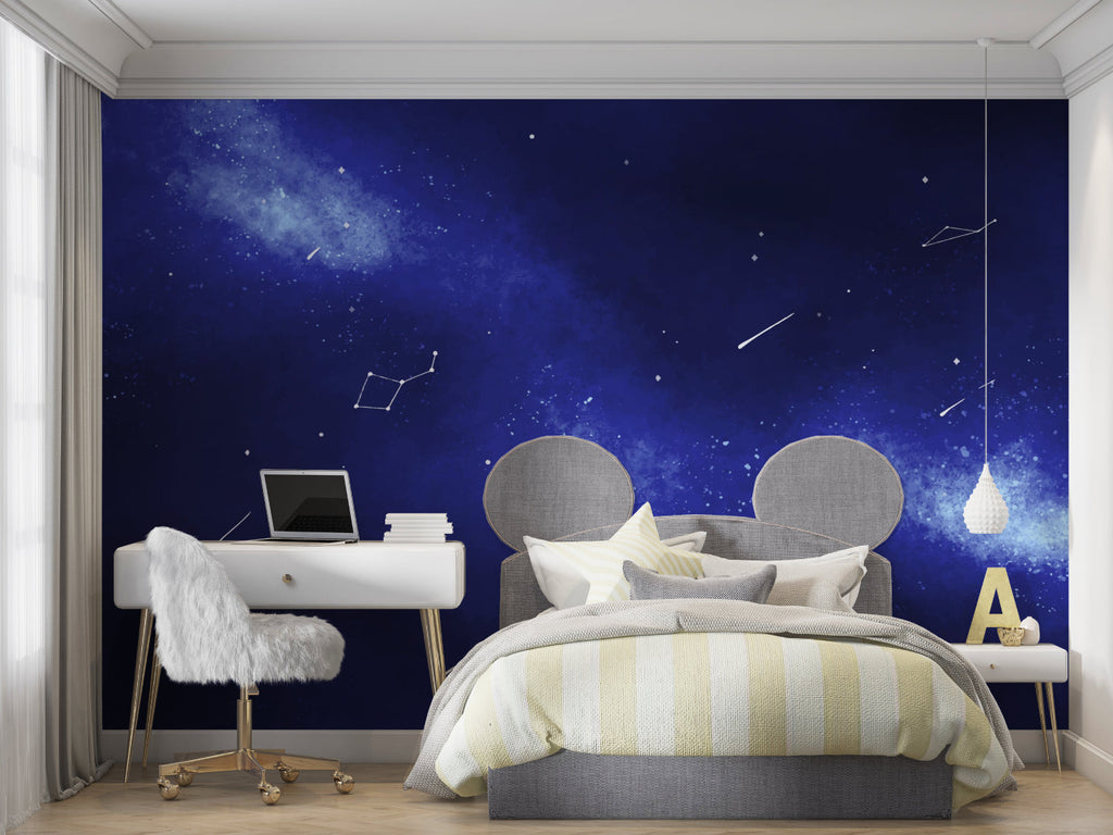 Galaxy wallpaper creating a dreamy atmosphere in a modern bedroom with ambient lighting