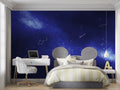 Galaxy wallpaper creating a dreamy atmosphere in a modern bedroom with ambient lighting