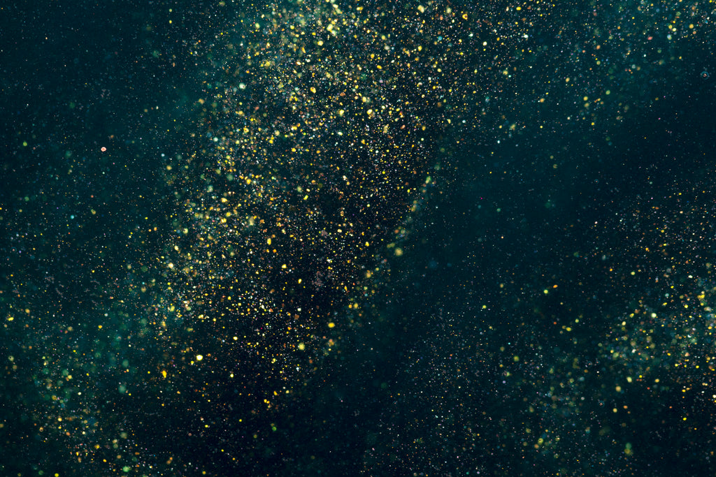 Design file showing intricate golden star pattern on deep teal background