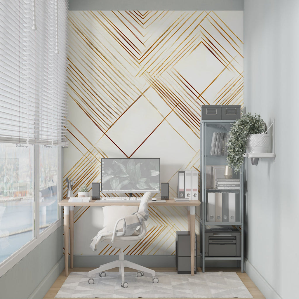 Gold geometric Art Deco wallpaper in modern living room with gray sofa and natural light