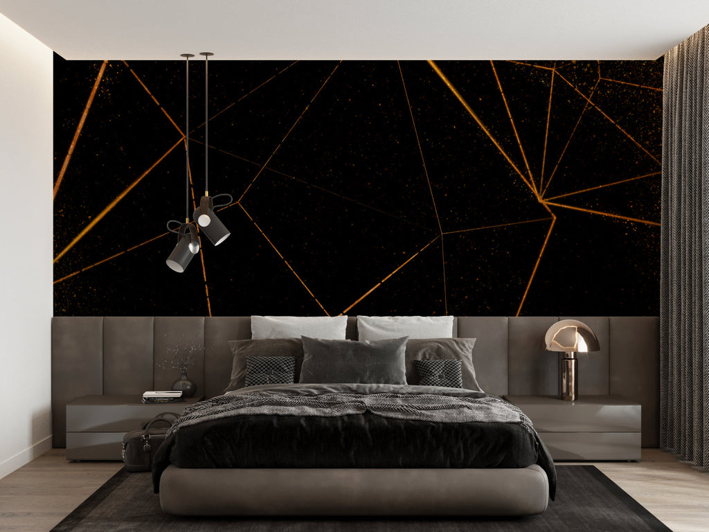 Black and gold geometric wallpaper in modern living room with tall windows and grey sofa