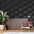 Black geometric wallpaper in modern living room showing 3D hexagon pattern casting subtle shadows on feature wall