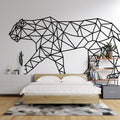 Geometric black panther line art wallpaper making a bold statement in a minimalist living room with white furniture