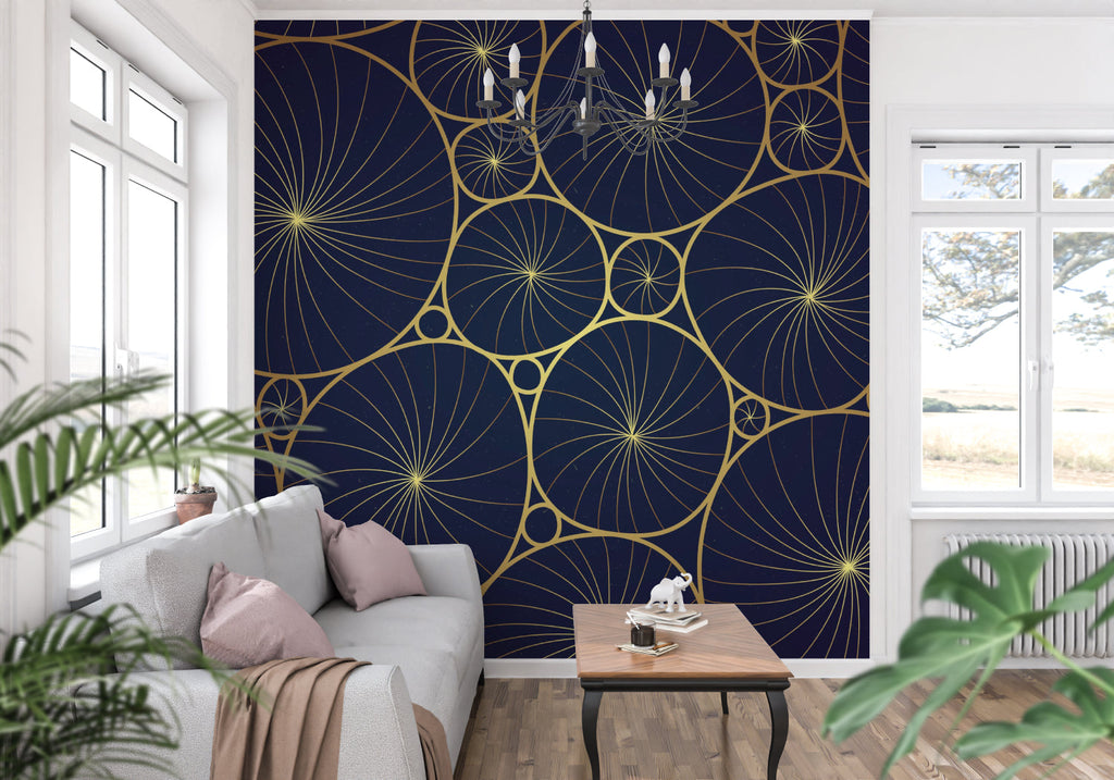 Navy and gold geometric pattern wallpaper brightening up a master bedroom
