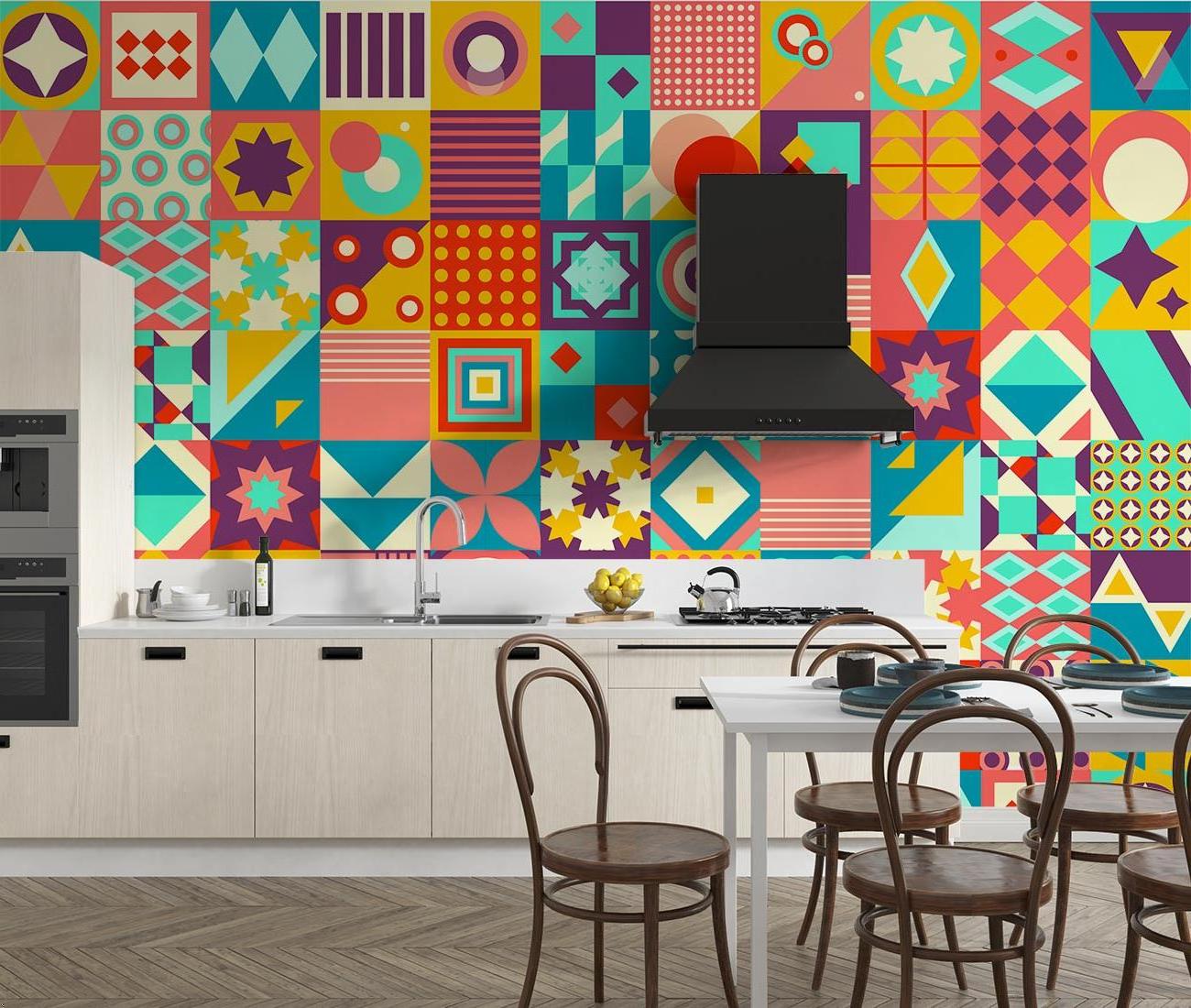 Geometric pattern wallpaper bringing vibrant energy to a modern living room with coral and turquoise accents