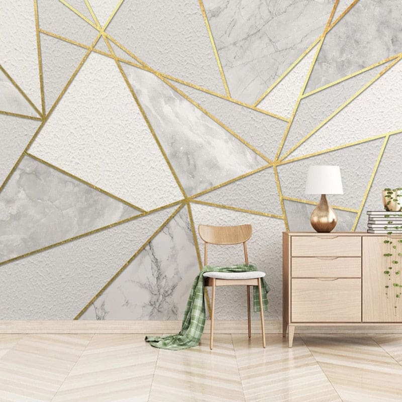 Geometric marble wallpaper with gold accents in dining room setting