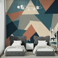 Modern geometric wallpaper creating a bold statement in a minimalist living room with teal and terracotta accents