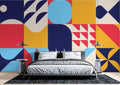 Modern Geometric Wallpaper transforms a bright living room with bold shapes and colorful art deco pattern