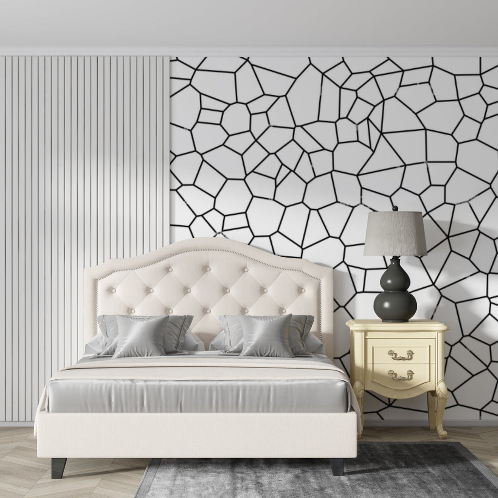 Modern geometric wallpaper in minimalist living room showing black and white pattern