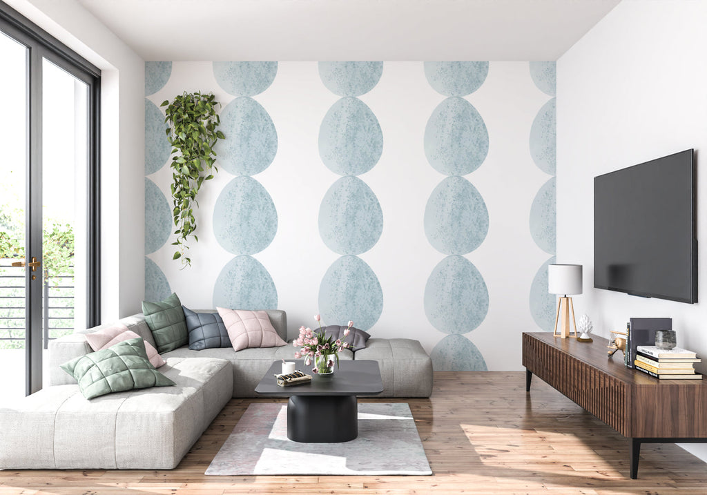 Geometric blue circle wall design in a contemporary bedroom setting