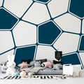Modern geometric wallpaper in bright home office with white desk and natural light