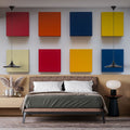 Modern geometric wallpaper with colorful squares brightening a minimalist living room with modern furniture