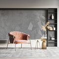 Grey geometric wallpaper in modern living room showing clean lines and angular patterns