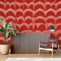 Modern red wave geometric wallpaper in a bright living room setting with contemporary furniture