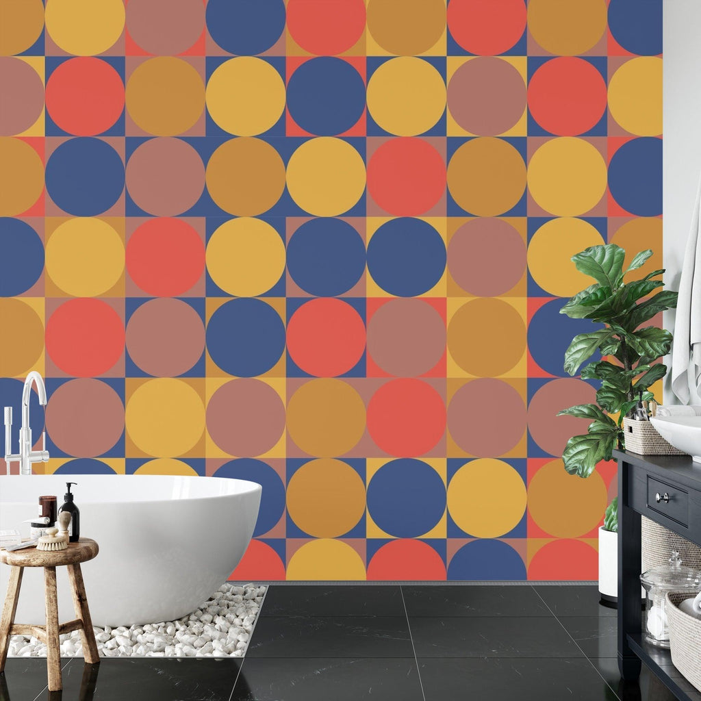 Modern home office featuring navy and terracotta circle pattern wallpaper on accent wall
