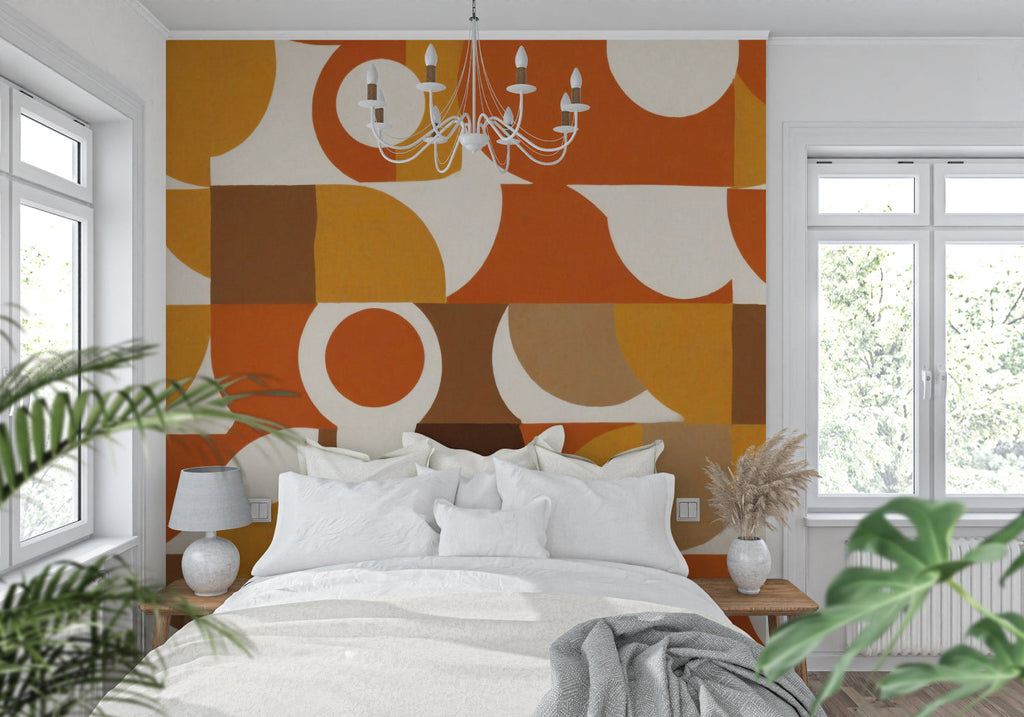 Modern geometric wallpaper with orange circles in a bright living room setting