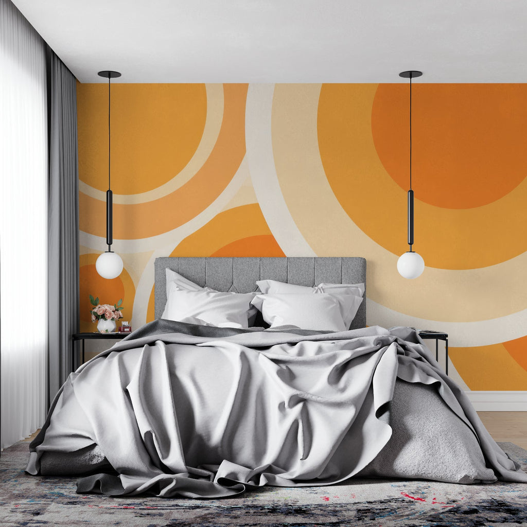 Geometric pattern wallpaper adding warmth to a bedroom setting