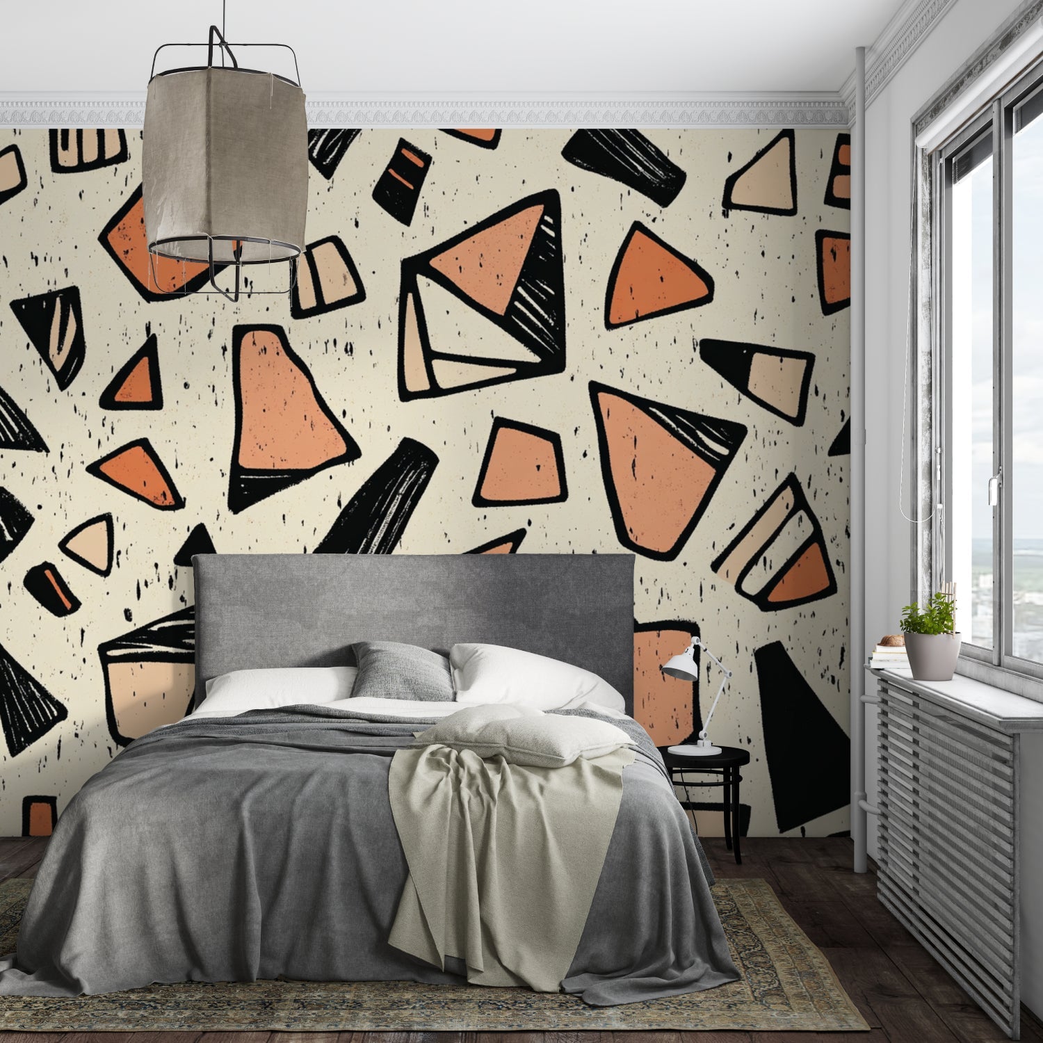 Abstract geometric wallpaper in bedroom creating warm atmosphere