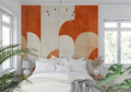 Geometric art deco wallpaper with terracotta arches in modern living room setting