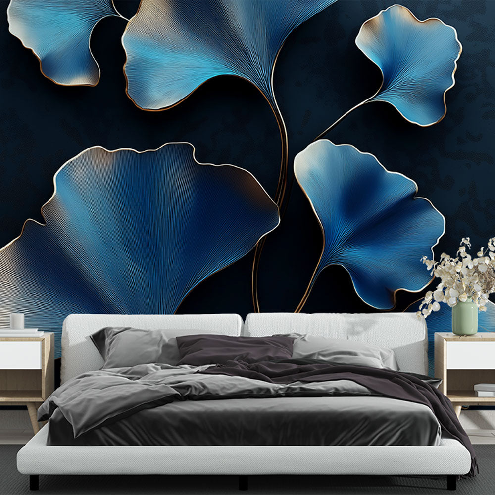 Blue and gold Ginkgo art deco wallpaper in a modern dining room with pendant lighting and dark furniture