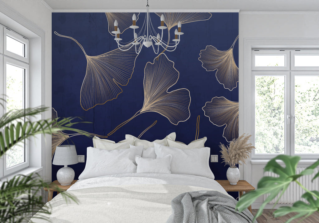 Gold leaf wallpaper accent wall in home office with modern desk setup